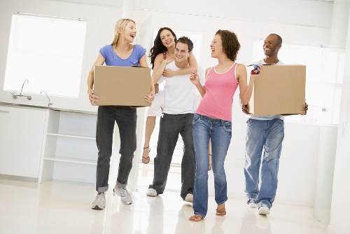 People safely moving items through a secure storage facility entrance